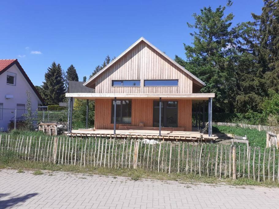 Gemuetliches Holzhaus Am See Warin Exterior foto